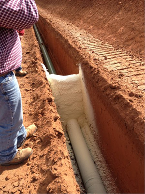 Installing spray foam trench breakers in Sacramento area CA