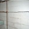 Severe foundation damage from a long crack in a bucking wall of a Davis home.