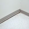 A partition wall separating from the floor in a Novato home.