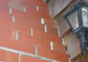 a repaired chimney in Carmichael that had shown serious foundation damage and was repaired with a helical pier system.