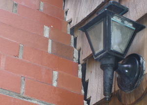 A tilting chimney in Carmichael showing serious foundation damage.